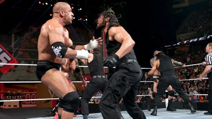 Roman Reigns with The Shield during the faction's 2014 rivalry with Evolution